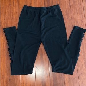 Black leggings with leg cutout